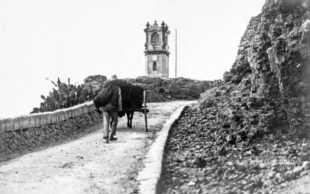 The road leading up to Xaghra, known as tas-Sellum, captured by EA Gouder in the 1920s.
