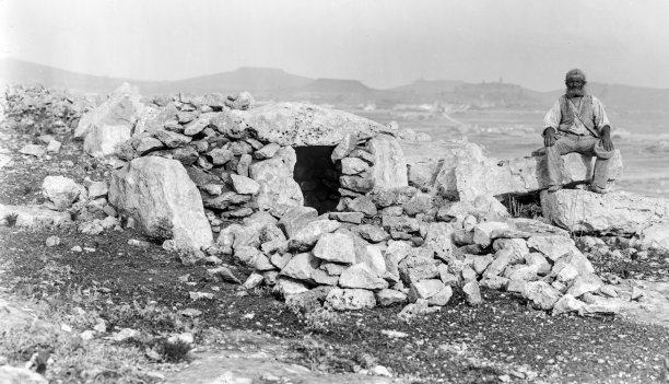 Two dolmens documented by Richard Ellis in the 1890s, with a Gozitan fellow seated nearby for scale.