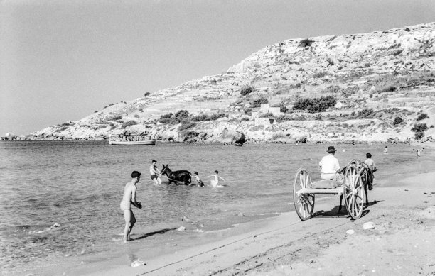 Ramla Bay, idyllic and barely touched, as captured by Guido Stilon in the 1960s.