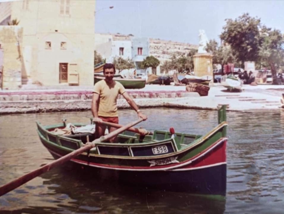 Man rowing a boat