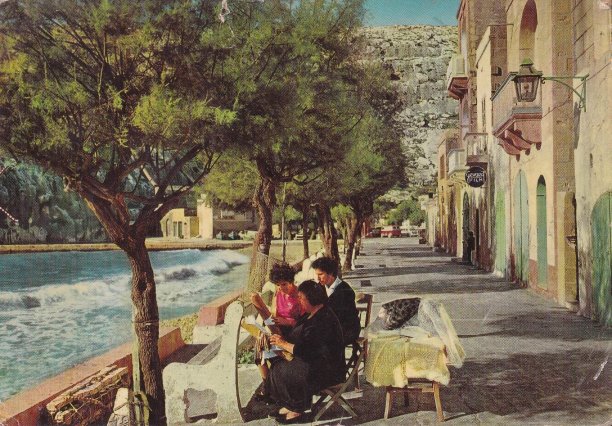 Lace making by the seafront of Xlendi