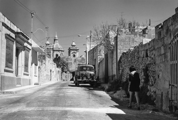 A street scape from Qala, as captured by Guido Stilon in 1964.