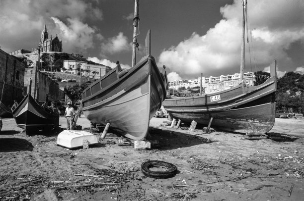 Boats perched in Mgarr Harbour, as captured by Guido Stilon in the 1960s.