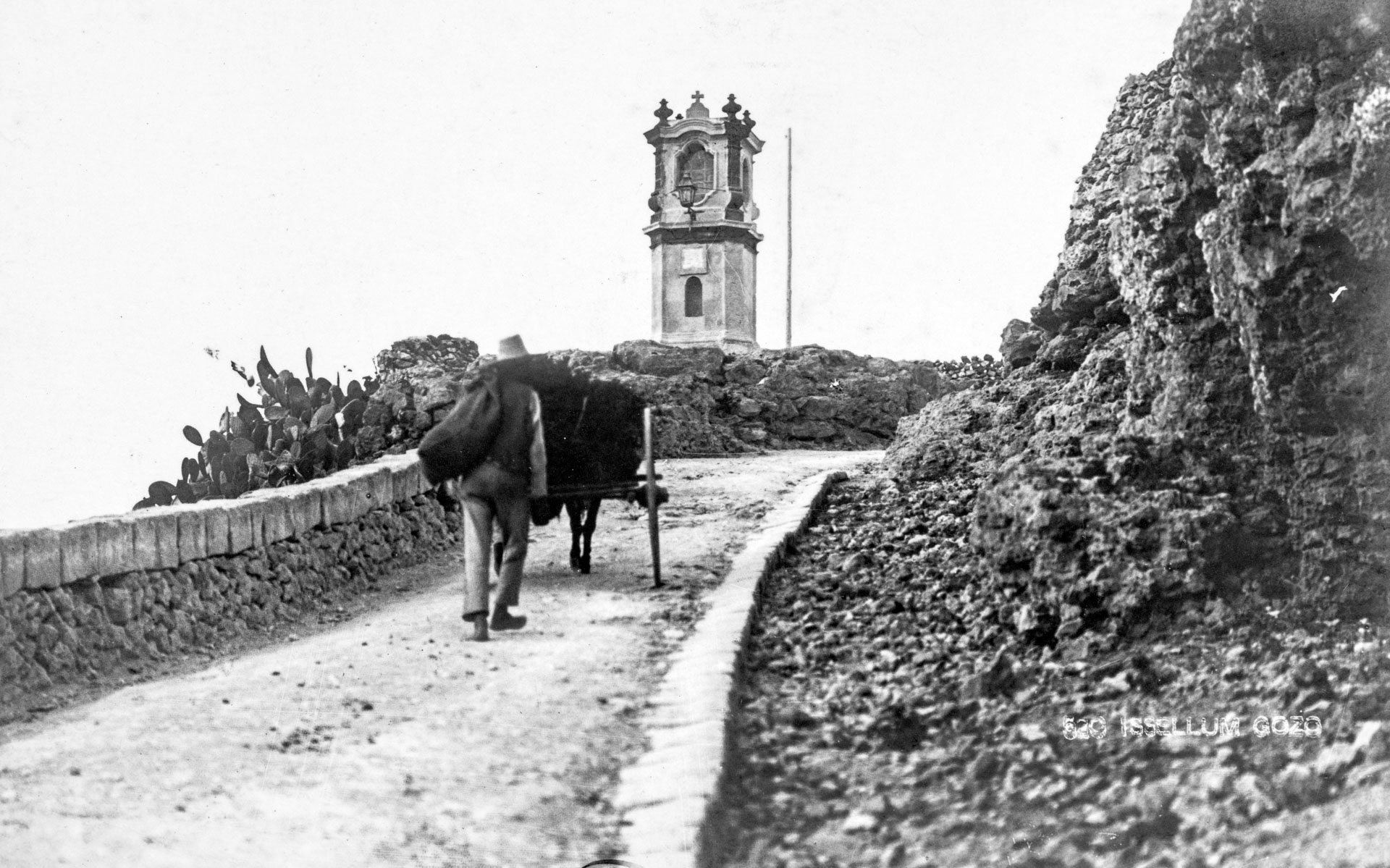 The road leading up to Xaghra, known as tas-Sellum, captured by EA Gouder in the 1920s.