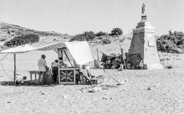 Ramla Bay, idyllic and barely touched, as captured by Guido Stilon in the 1960s.