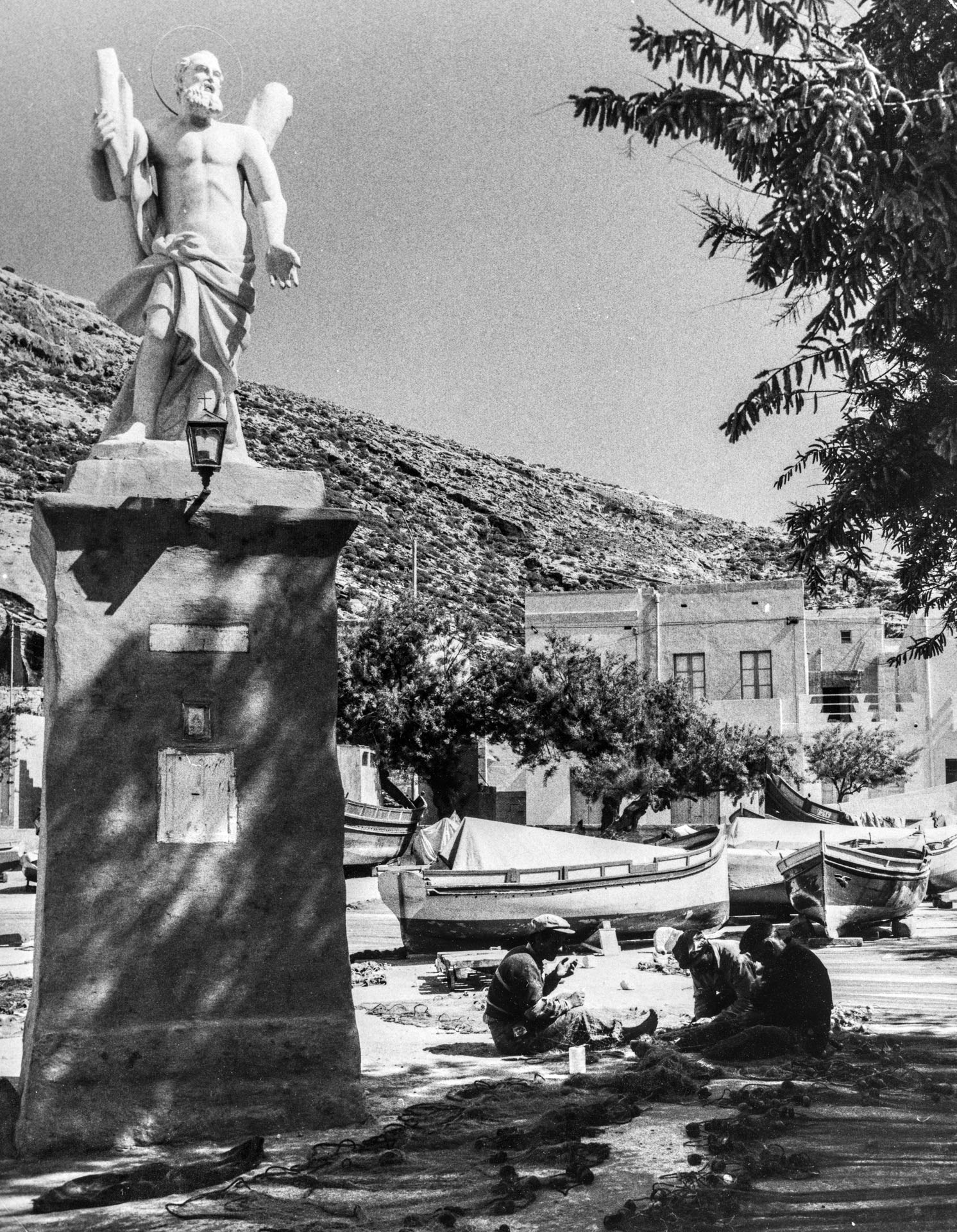 The statue of St Andrew watching over fishermn in Xlendi Bay, circa 1970, as captured by Gino Theuma.