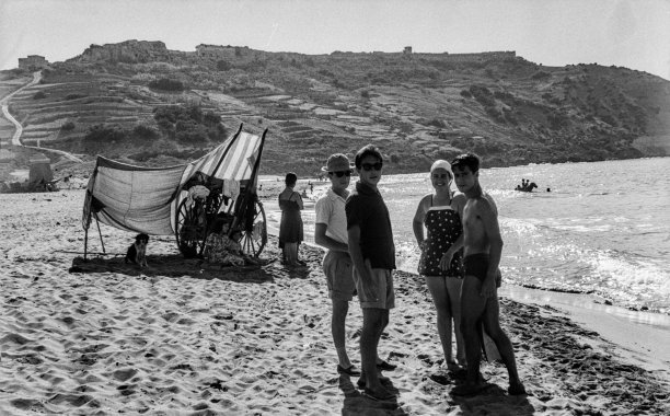 Ramla Bay, idyllic and barely touched, as captured by Guido Stilon in the 1960s.