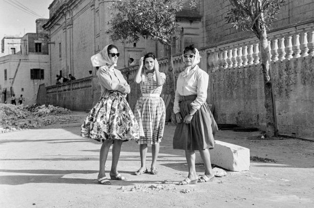 Three ladies pose in Nadur, as captured by Guido Stilon in the 1960s.
